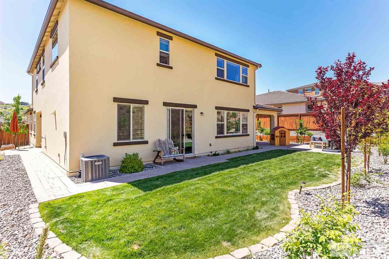 1650 Scott Valley Road Reno, NV 89523 - Photo 21 of 25 a front view of a house with a yard