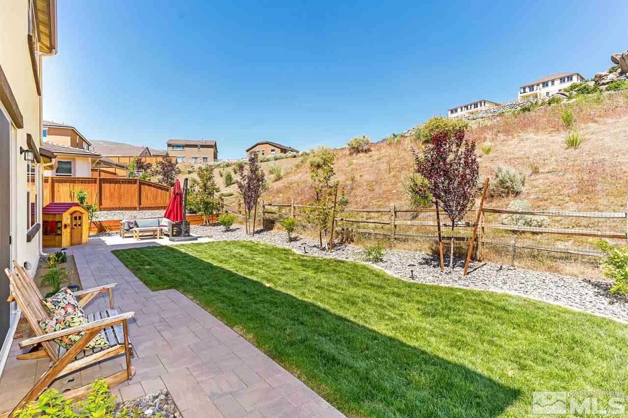 1650 Scott Valley Road Reno, NV 89523 - Photo 24 of 25 a view of a garden with a building in the background