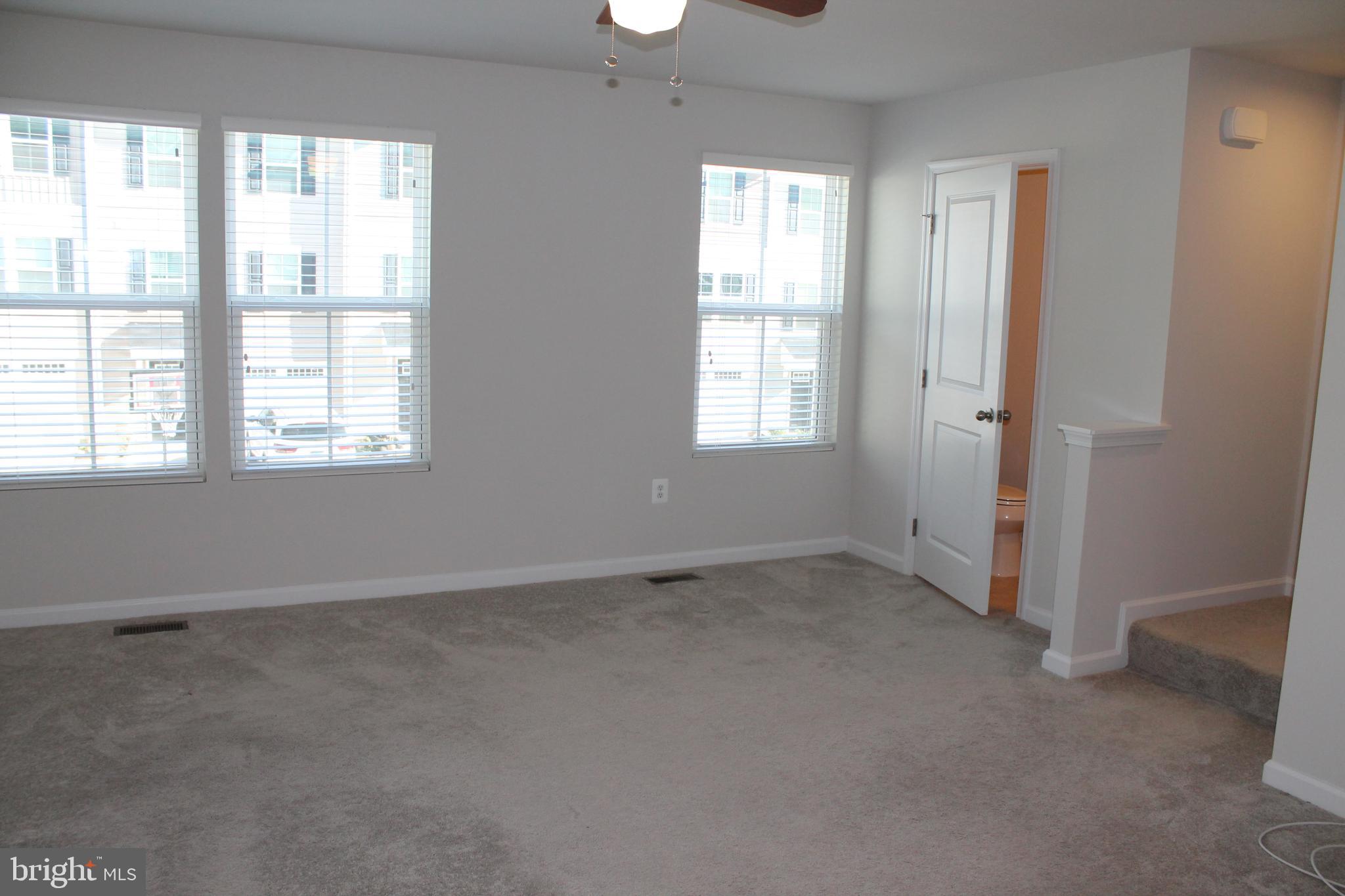 104 Reign Way Winchester, VA 22603 - Photo 12 of 27 an empty room with a window