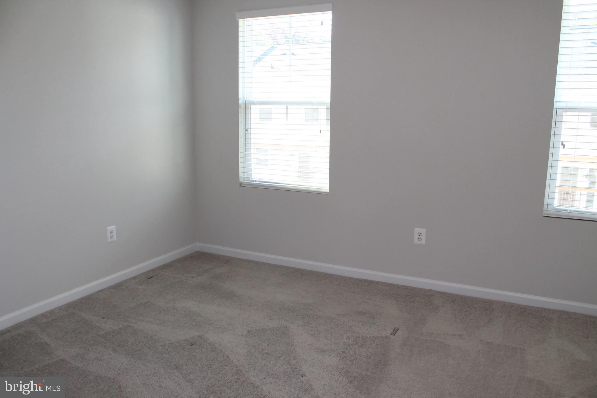 104 Reign Way Winchester, VA 22603 - Photo 14 of 27 an empty room with a window