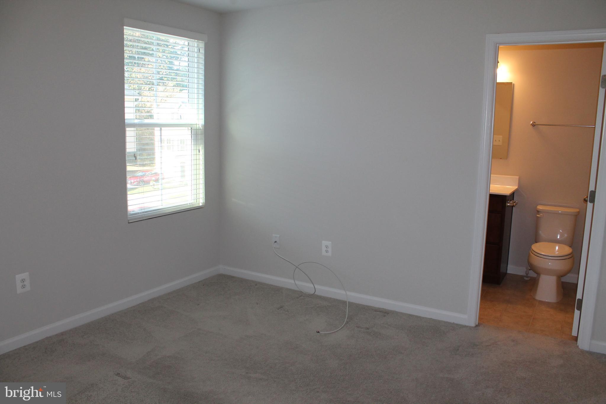 104 Reign Way Winchester, VA 22603 - Photo 16 of 27 an empty room and a window
