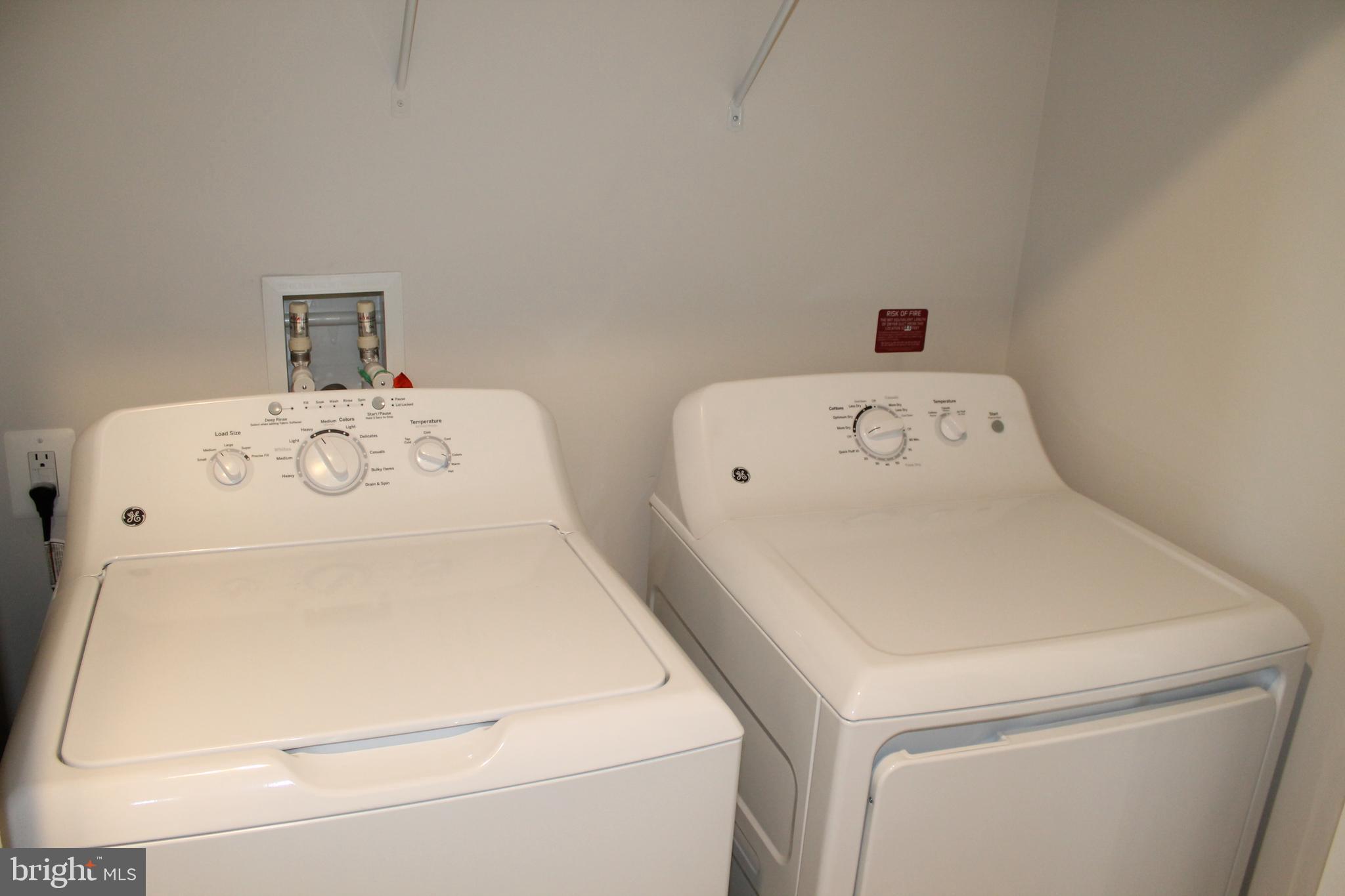 104 Reign Way Winchester, VA 22603 - Photo 20 of 27 a utility room with dryer and washer