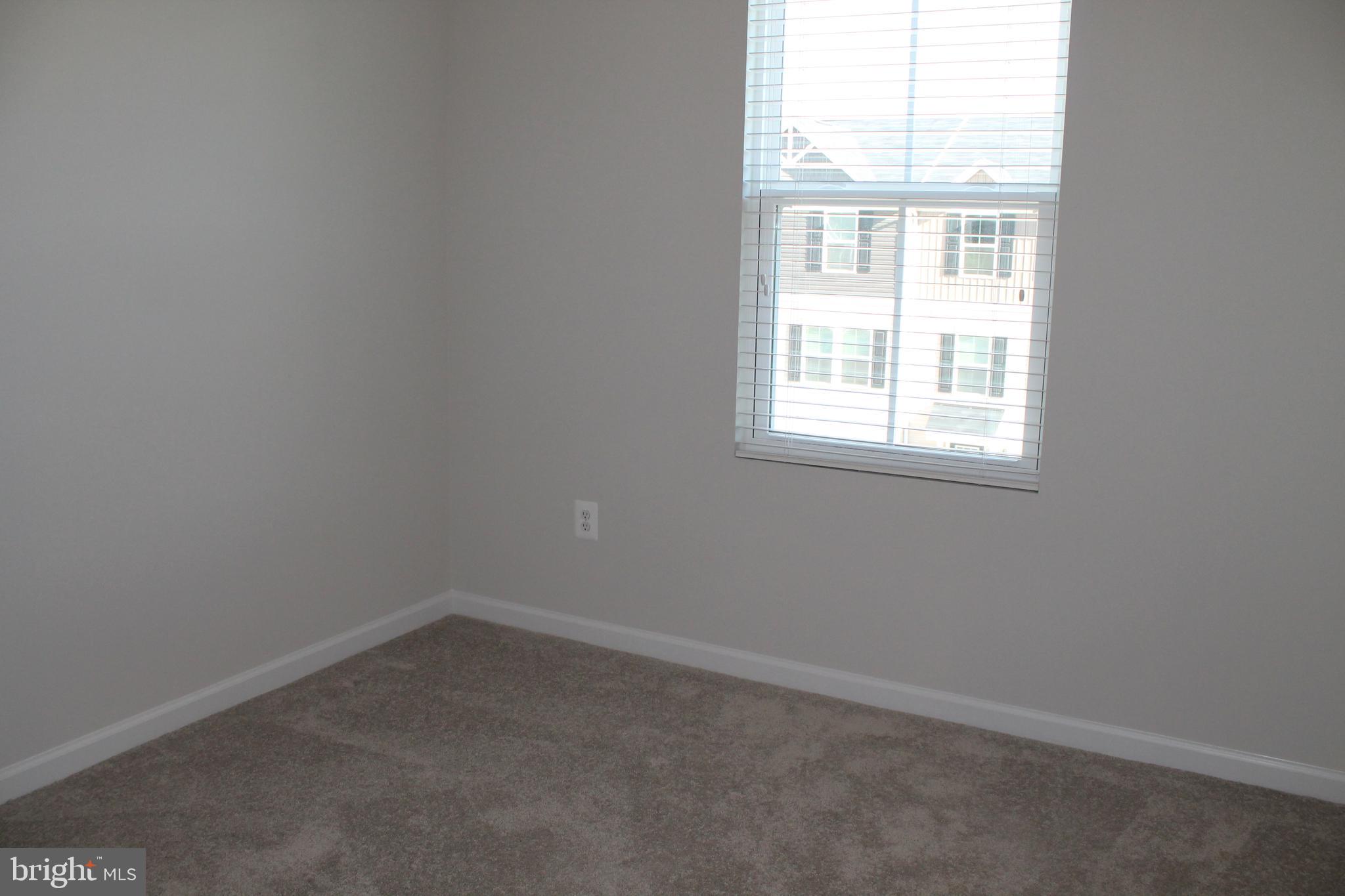 104 Reign Way Winchester, VA 22603 - Photo 21 of 27 an empty room with a window