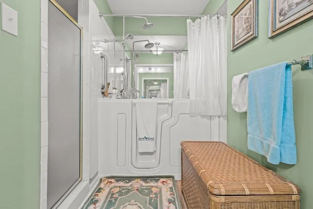 view of hall way with mirror