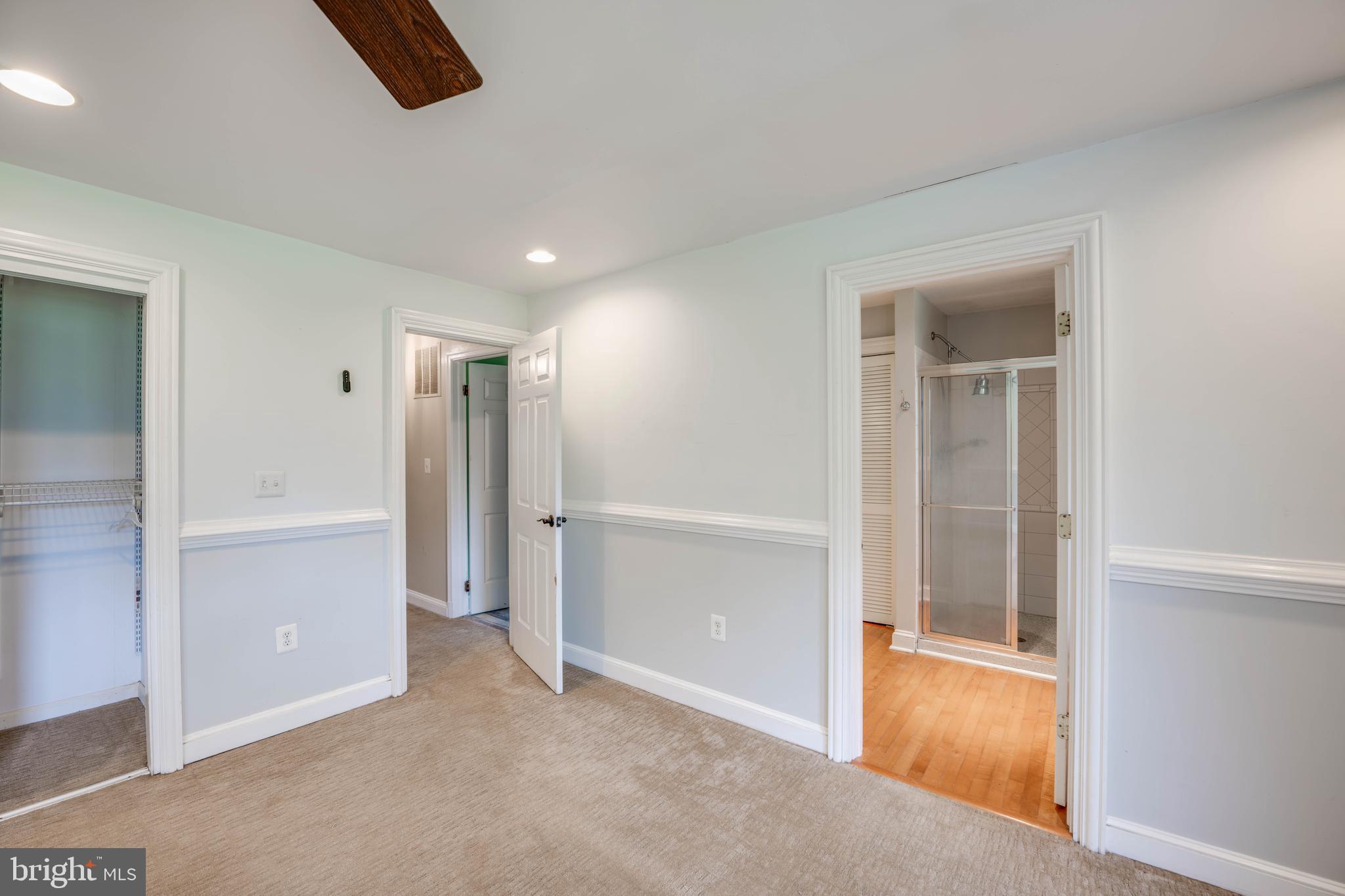 2809 Monkton Road Monkton, MD 21111 - Photo 23 of 27 an empty room with closet and windows