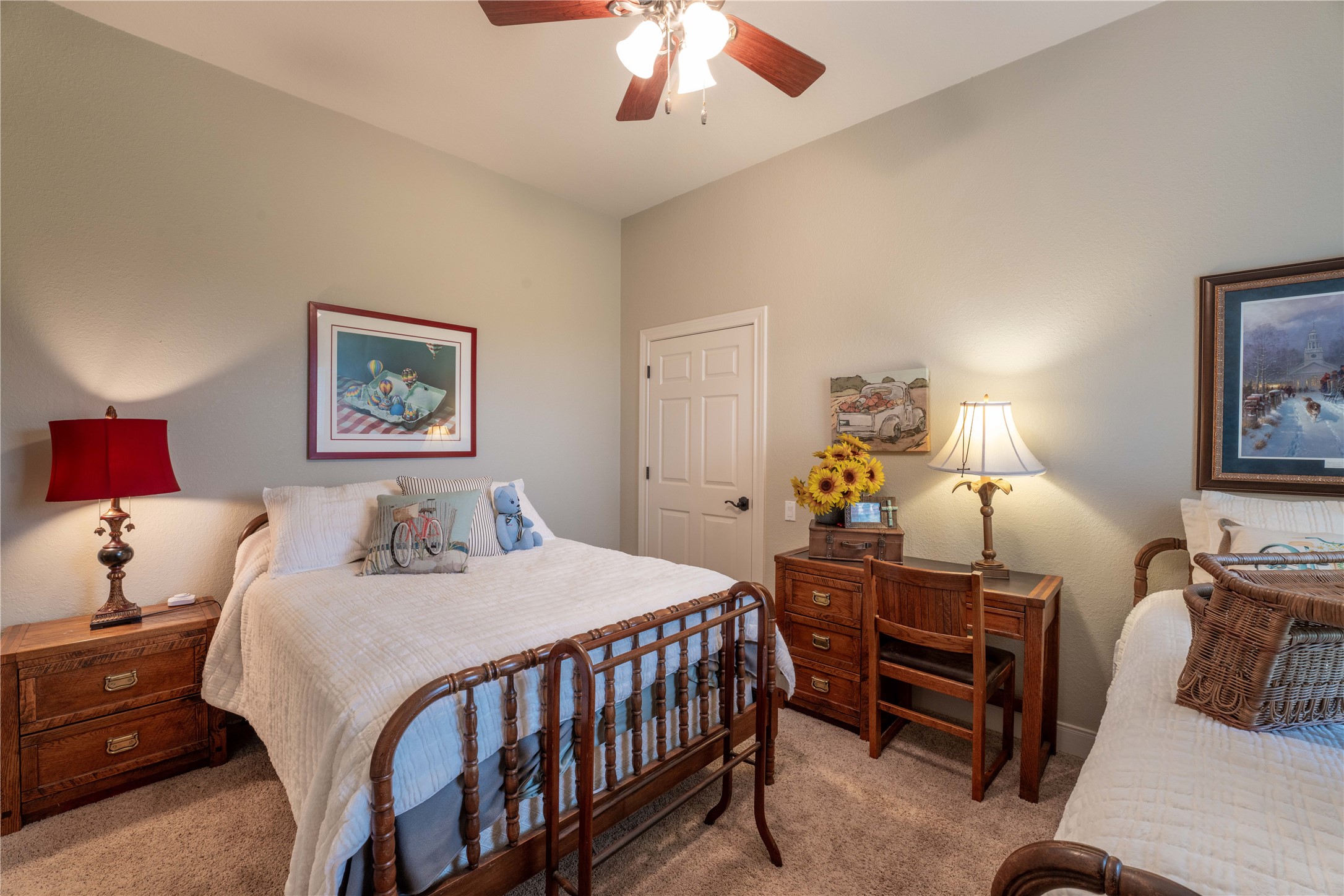 2007 FM 2434 Weimar, TX 78962 - Photo 14 of 44 a bedroom with a bed and a chandelier