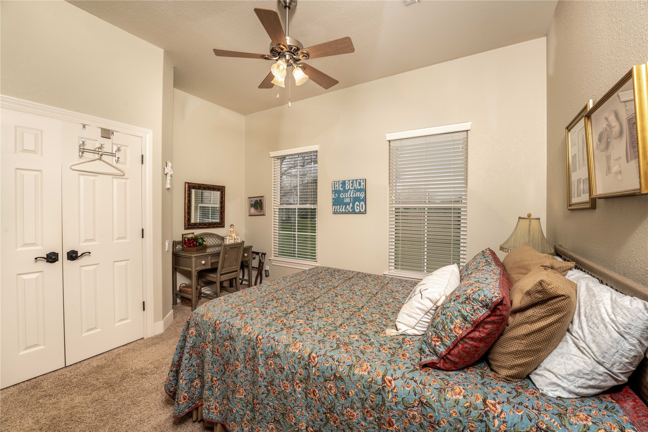 2007 FM 2434 Weimar, TX 78962 - Photo 18 of 44 a bedroom with a bed and a chandelier