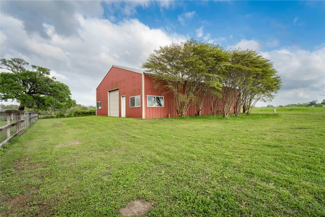 a front view of house with garden