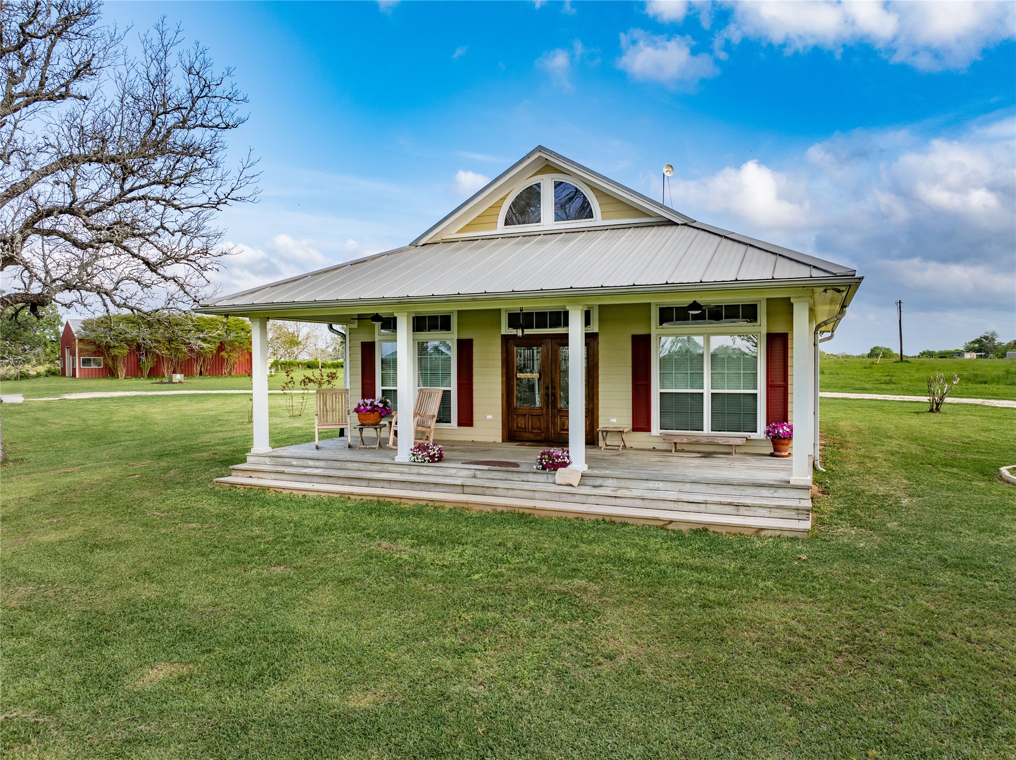 2007 FM 2434 Weimar, TX 78962 - Photo 35 of 44 a front view of a house with a yard table and chairs