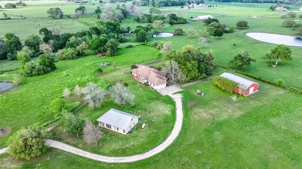a view of a play house with a backyard