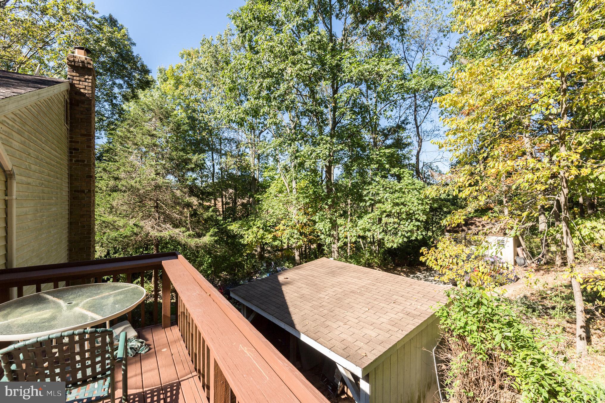 4311 York Road, Unit 1 Manchester, MD 21102 - Photo 31 of 42 a view of a balcony with wooden floor and fence