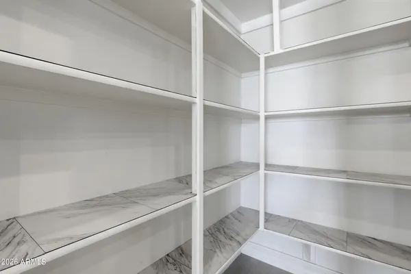 a view of an empty walk in closet