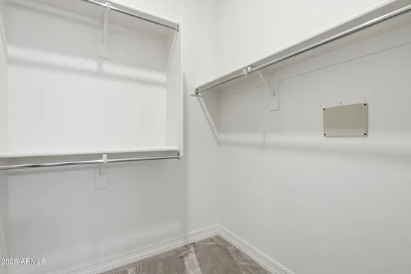 a view of an empty walk in closet