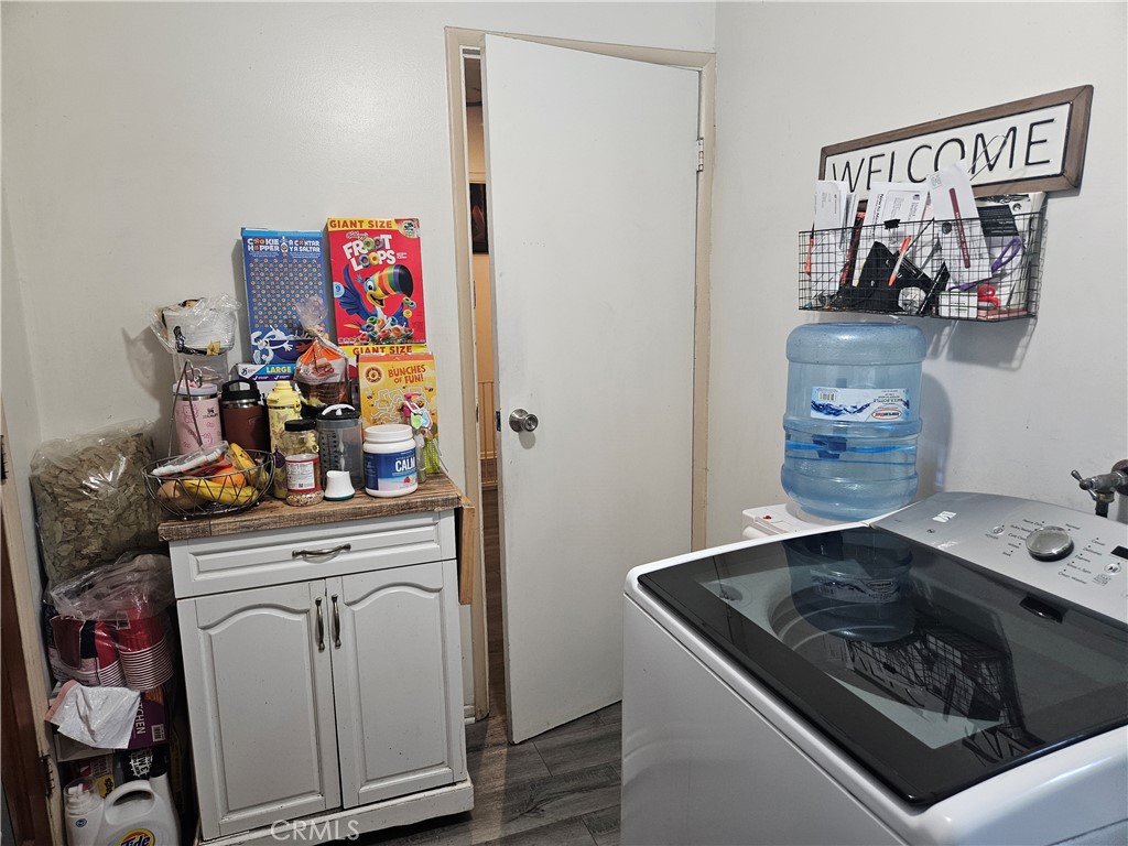 537 East 3rd Street Rialto, CA 92376 - Photo 24 of 47 a utility room with dryer and washer