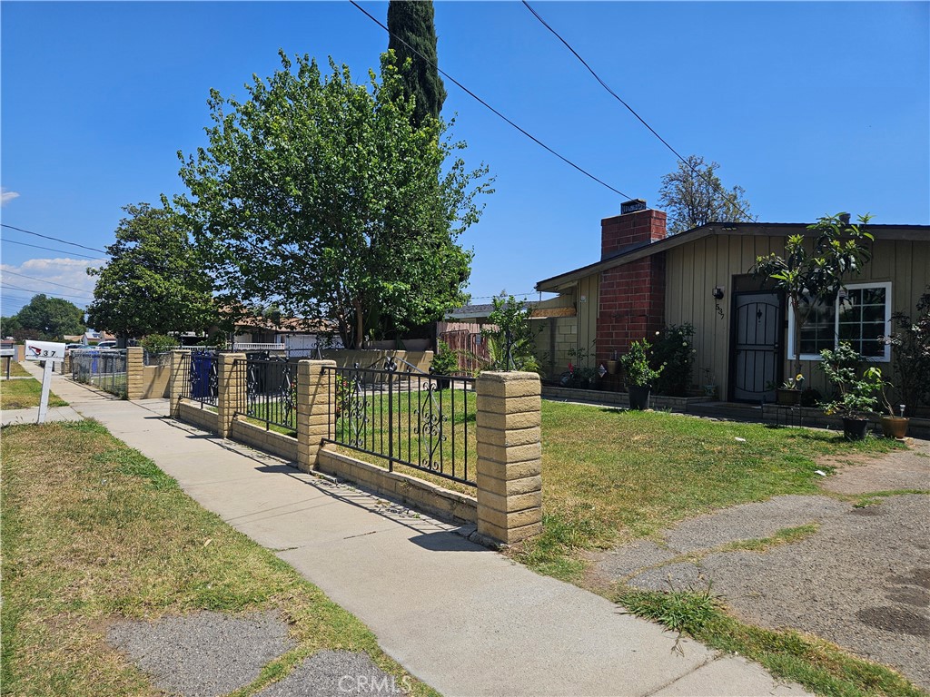 537 East 3rd Street Rialto, CA 92376 - Photo 8 of 47 a view of a wrought iron fences in front of house
