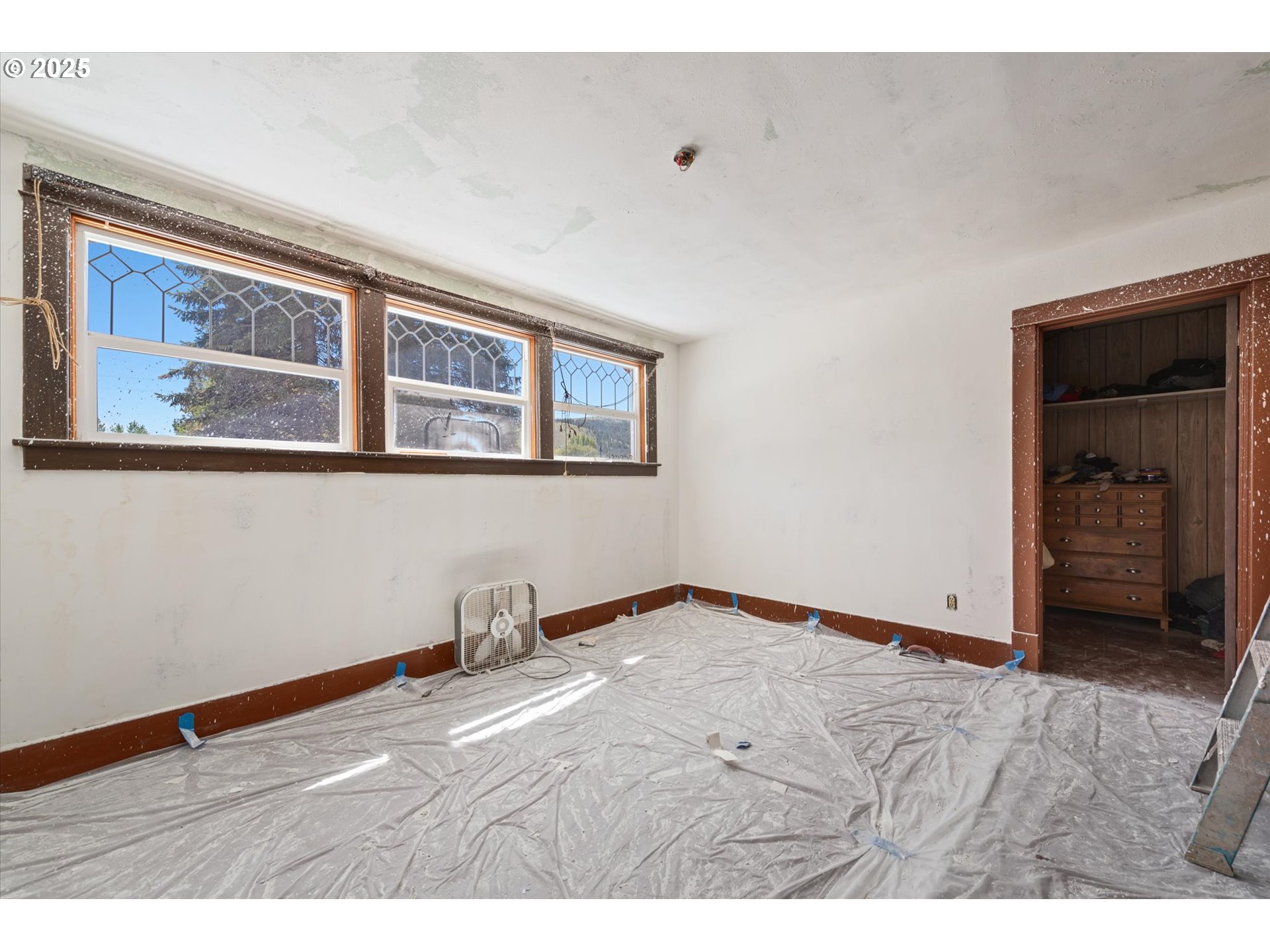 37867 Highway 414 Halfway Or 97834 Halfway, OR 97834 - Photo 25 of 48 a view of an empty room with wooden floor