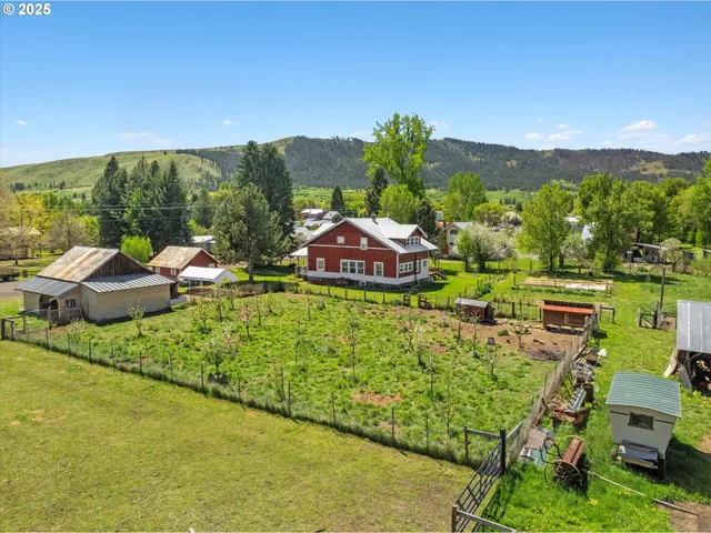 a view of a garden with a lake