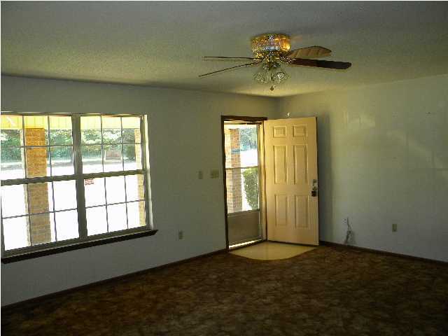 5260 Keyser Mill Road Baker, FL 32531 - Photo 4 of 17 a view of an empty room with a window