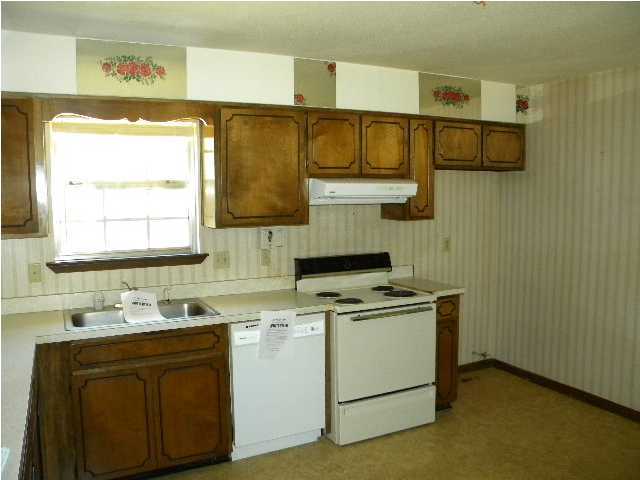 5260 Keyser Mill Road Baker, FL 32531 - Photo 5 of 17 a view of a kitchen with electric appliances