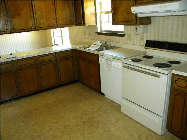 5260 Keyser Mill Road Baker, FL 32531 - Photo 6 of 17 a utility room with sink dryer and washer