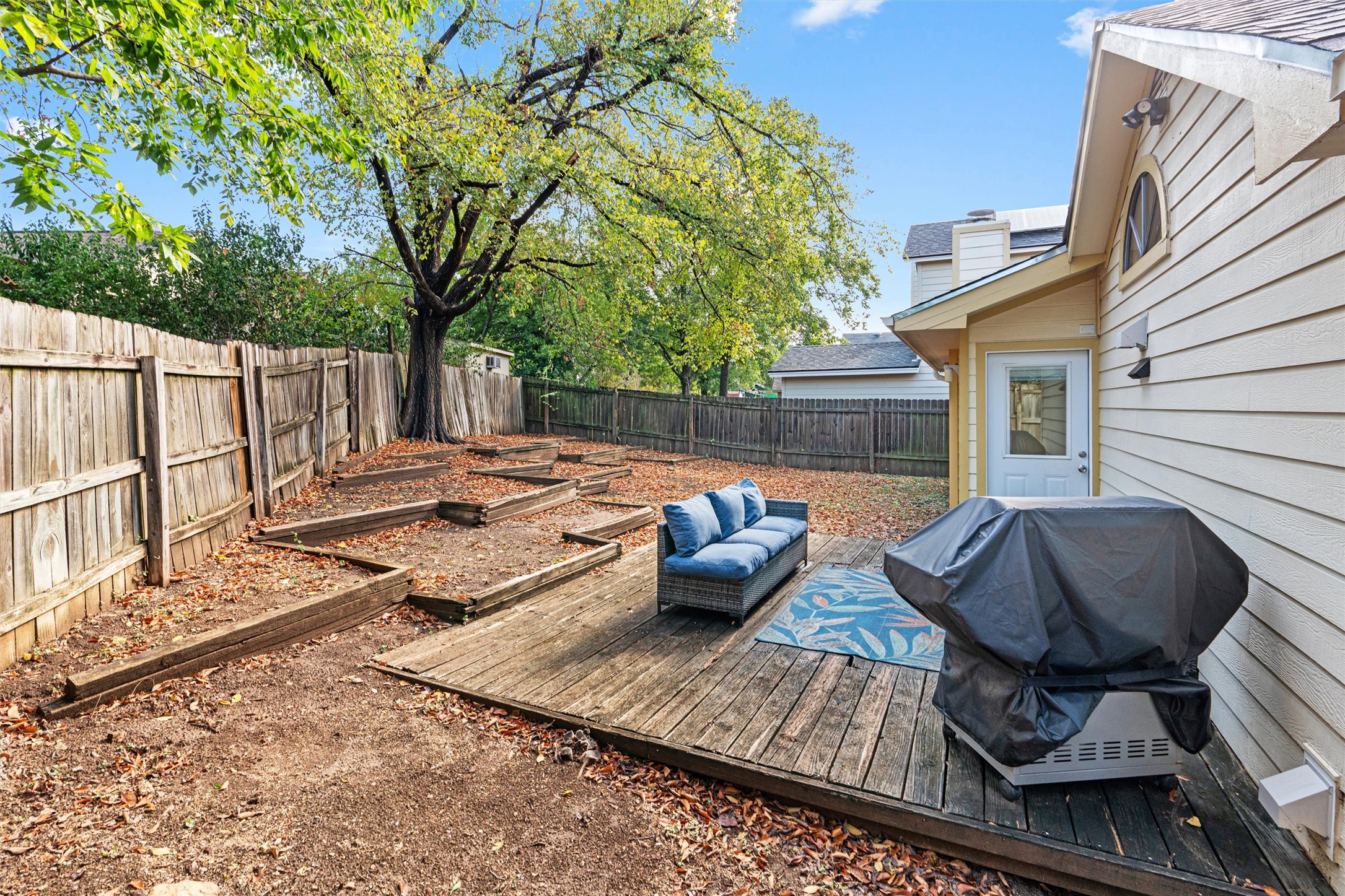 2010 Cervin Boulevard Austin, TX 78728 - Photo 23 of 32 a view of a patio with couches chairs and a fire pit