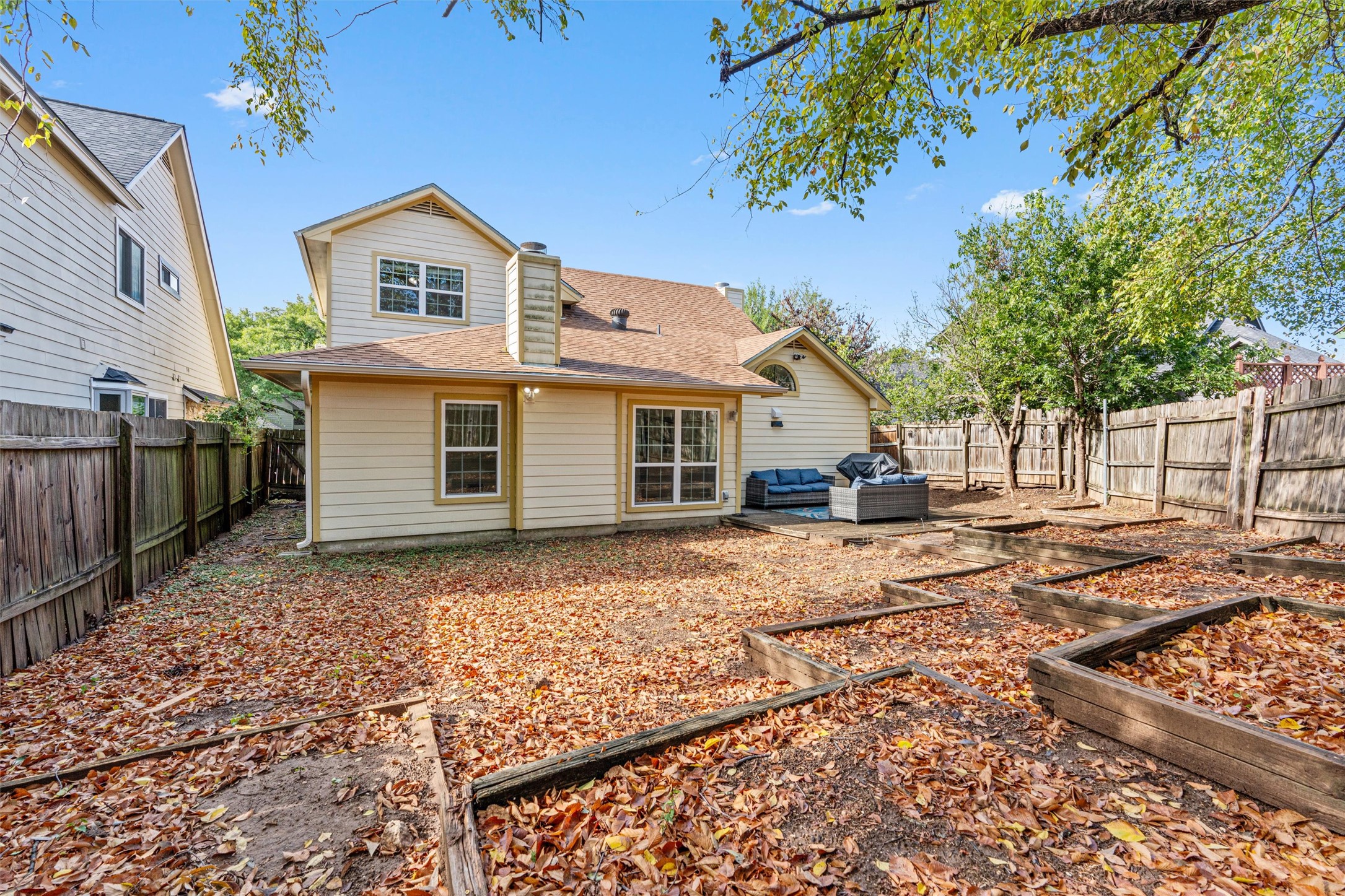 2010 Cervin Boulevard Austin, TX 78728 - Photo 25 of 32 a front view of a house with a yard and garage