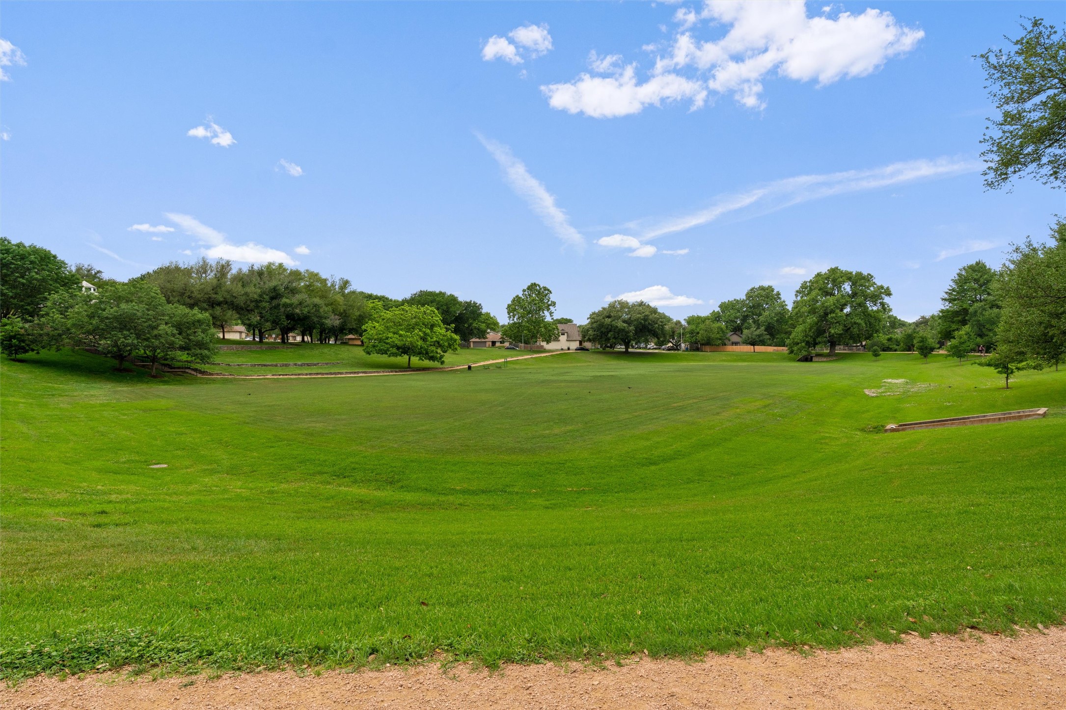 2010 Cervin Boulevard Austin, TX 78728 - Photo 30 of 32 a view of a golf course with a lake