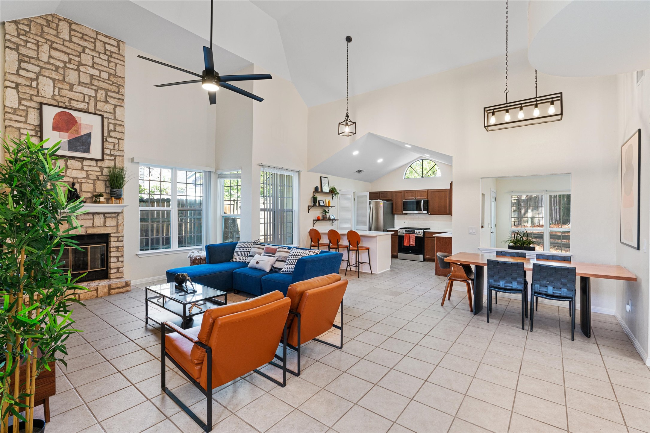 2010 Cervin Boulevard Austin, TX 78728 - Photo 3 of 32 a living room with furniture kitchen view and a chandelier