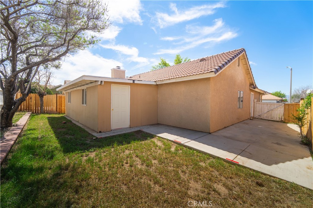 36806 Meadowview Court Palmdale, CA 93552 - Photo 15 of 17 a view of a backyard