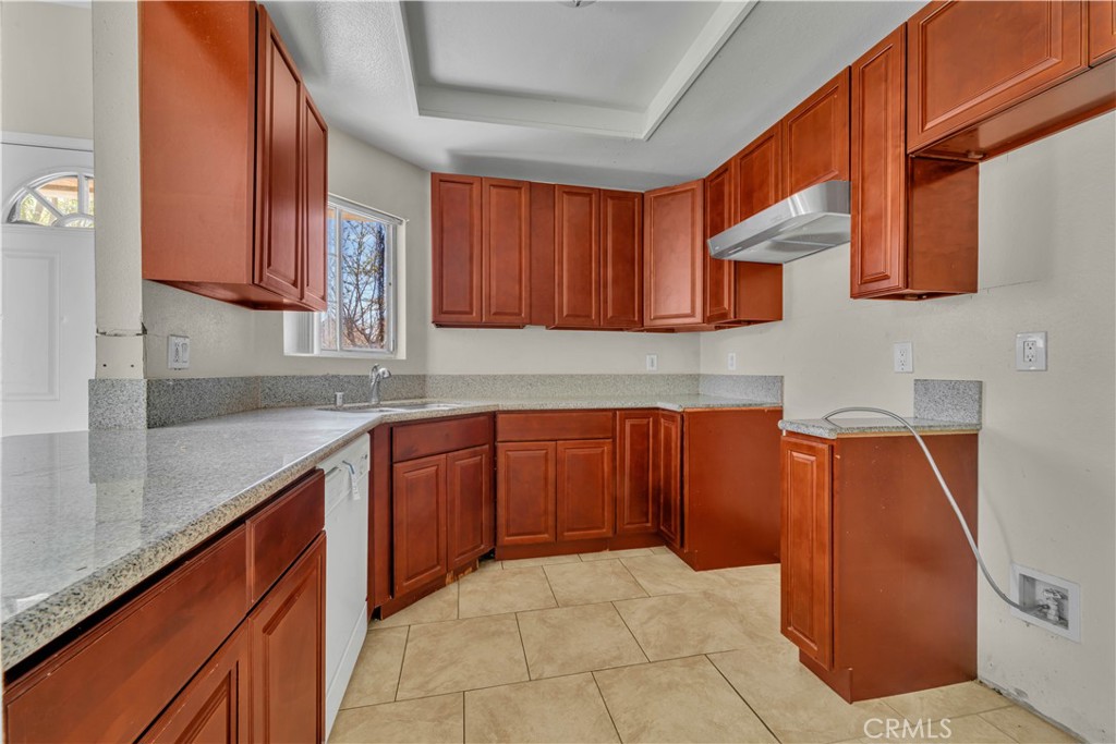 36806 Meadowview Court Palmdale, CA 93552 - Photo 2 of 17 a kitchen with stainless steel appliances granite countertop a sink stove and cabinets