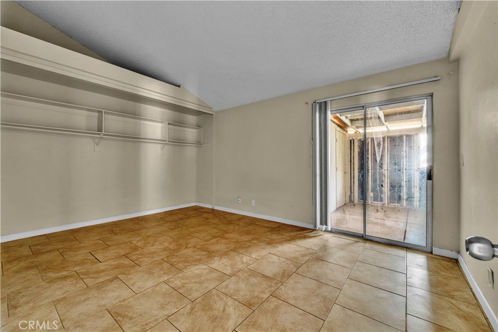 36806 Meadowview Court Palmdale, CA 93552 - Photo 8 of 17 a view of an empty room and window