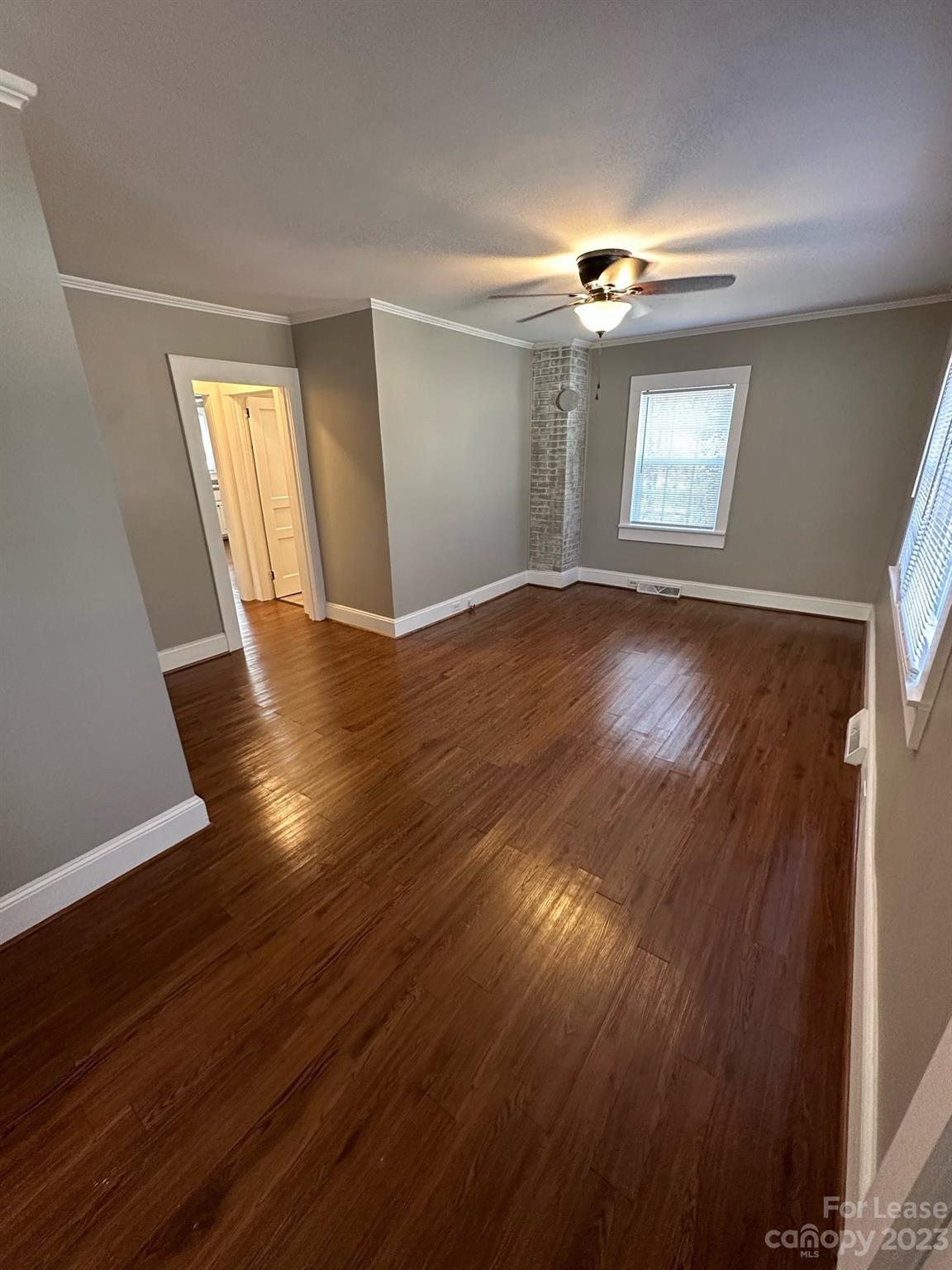 5650 Old Monroe Circle Concord, NC 28025 - Photo 2 of 11 a view of empty room with window and wooden floor