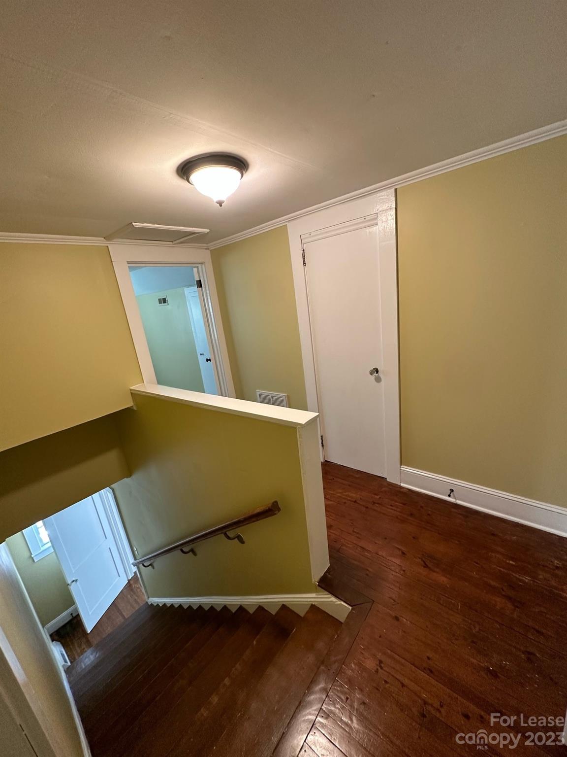 5650 Old Monroe Circle Concord, NC 28025 - Photo 8 of 11 an empty room with wooden floor