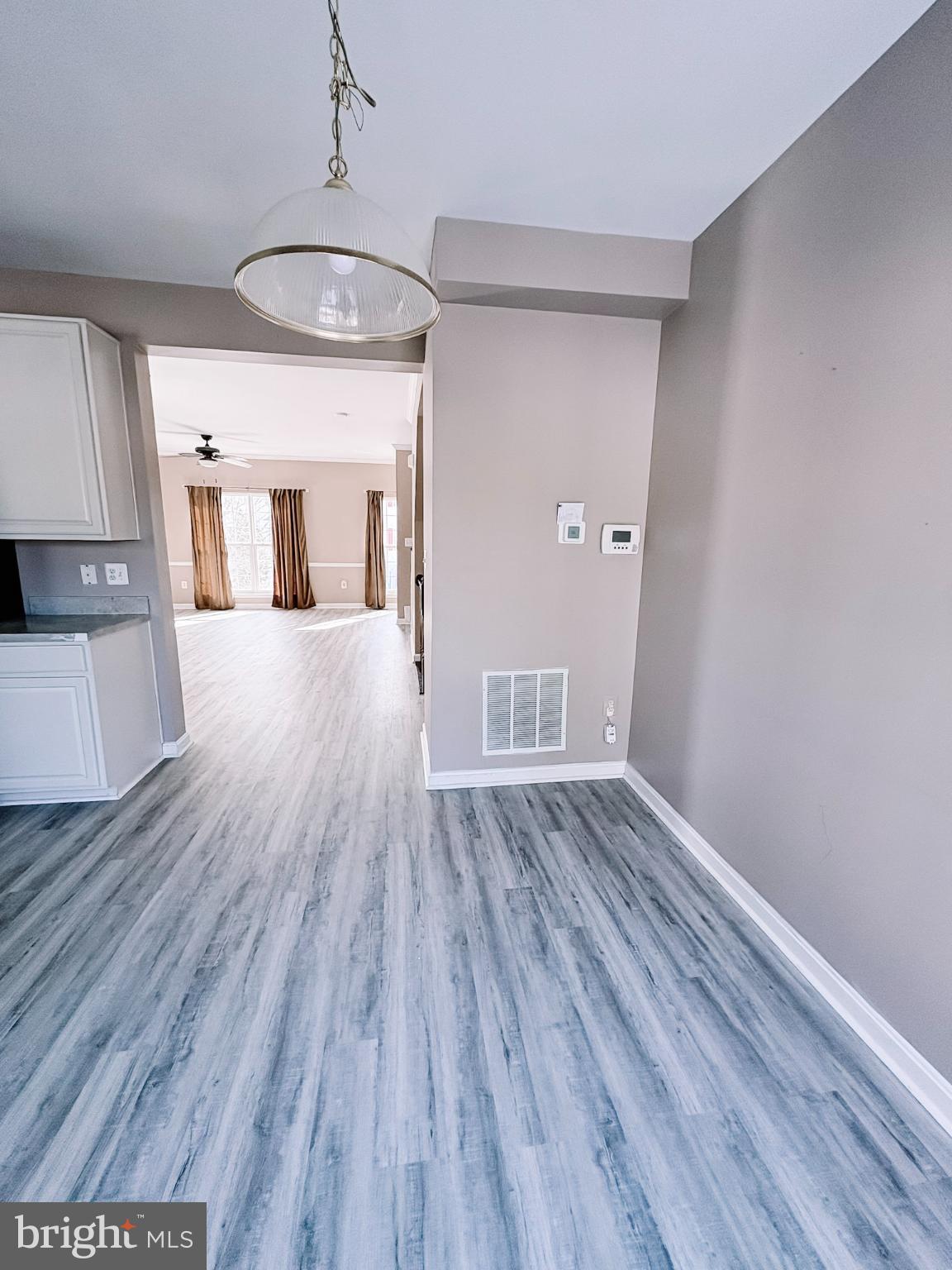 6151 Newton Lane Bealeton, VA 22712 - Photo 22 of 47 wooden floor in an empty room with a window