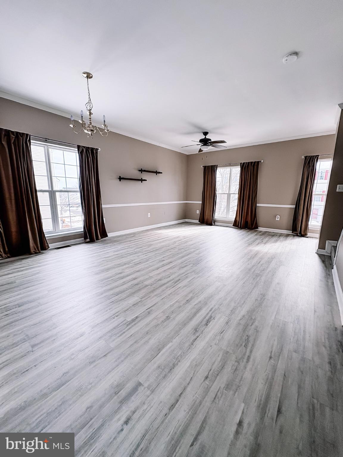 6151 Newton Lane Bealeton, VA 22712 - Photo 24 of 47 a view of empty room with wooden floor and fan