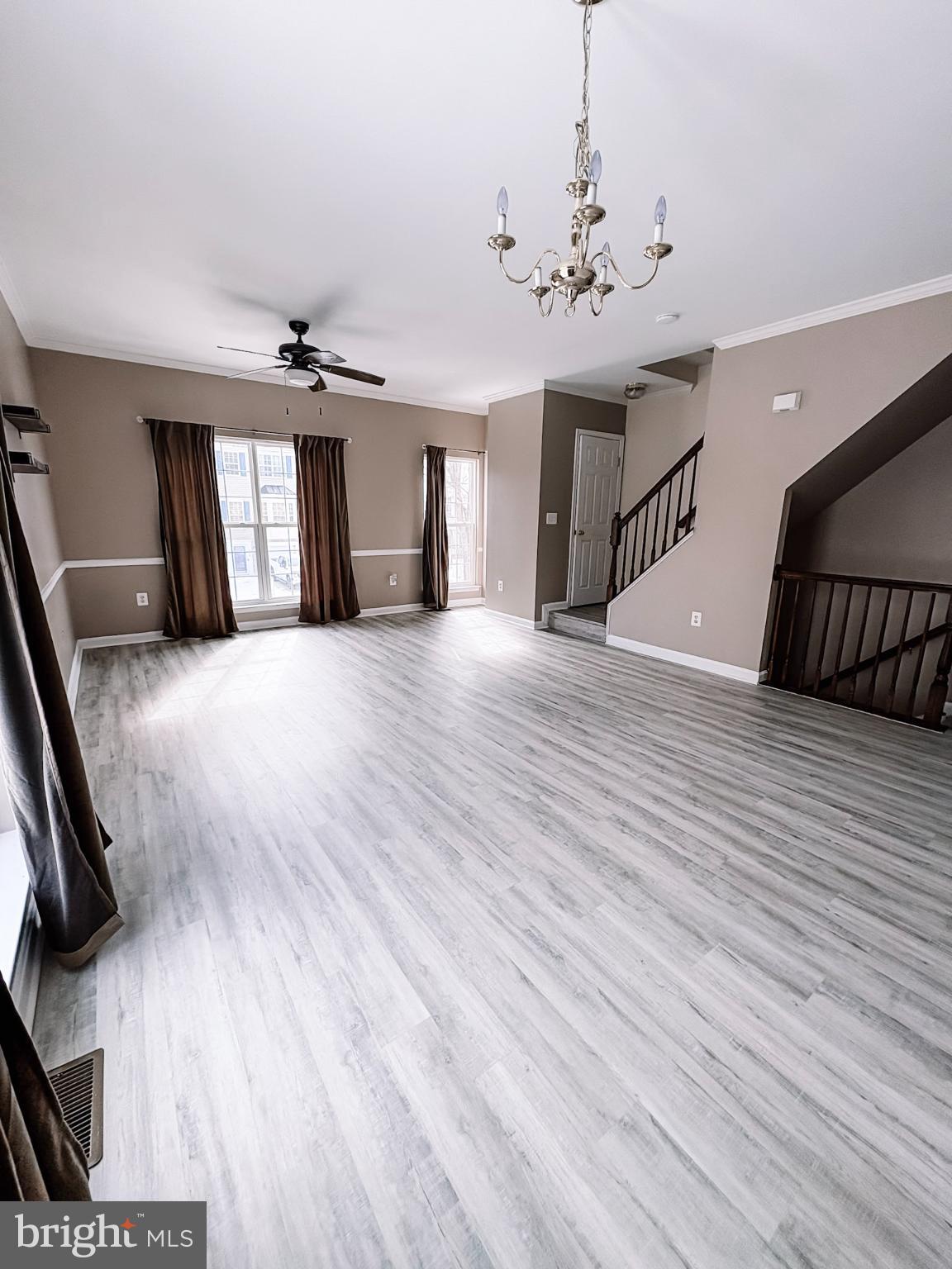 6151 Newton Lane Bealeton, VA 22712 - Photo 26 of 47 a view of a livingroom with hardwood floor and a ceiling fan