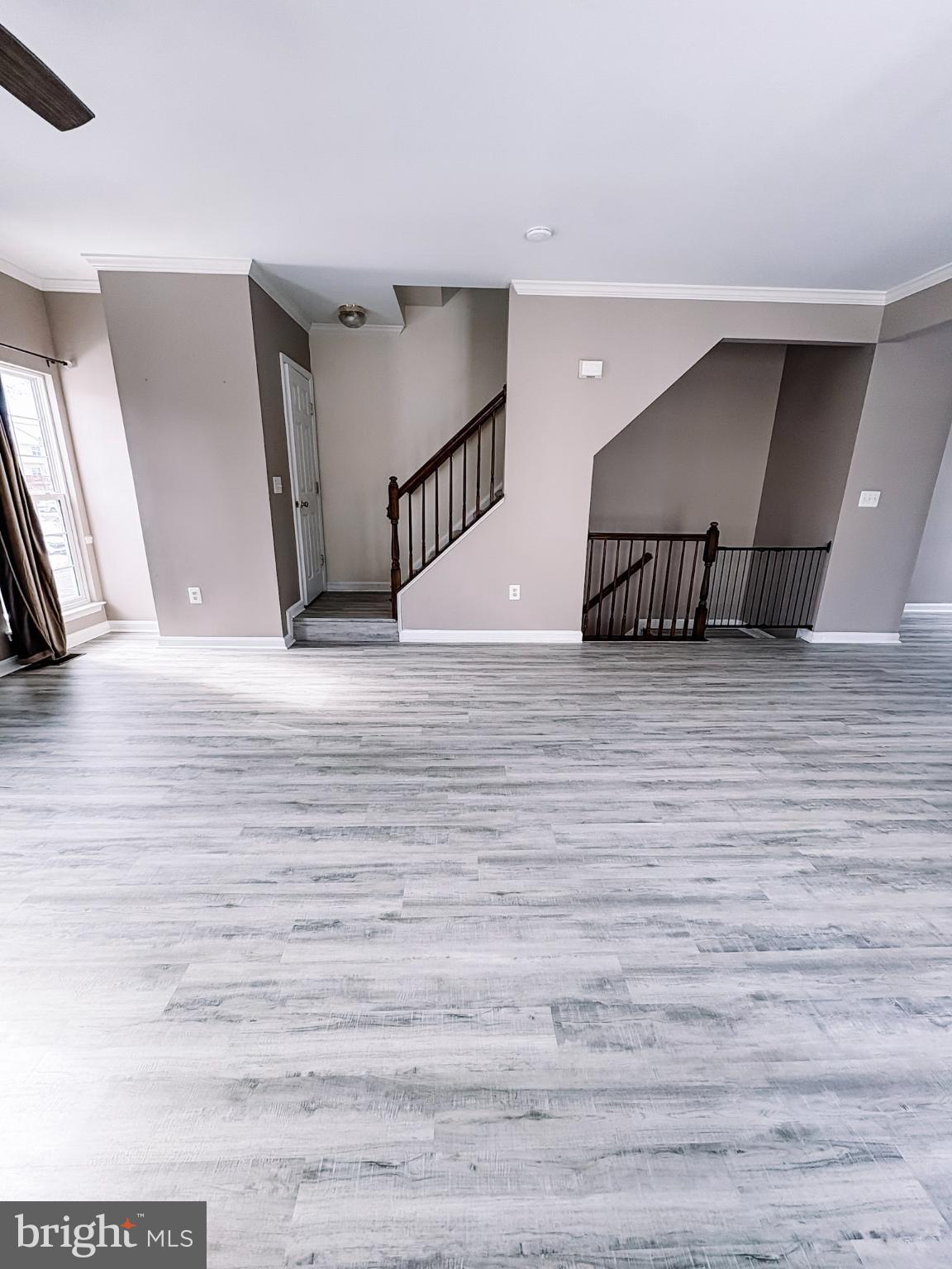 6151 Newton Lane Bealeton, VA 22712 - Photo 27 of 47 a view of a livingroom with a staircase
