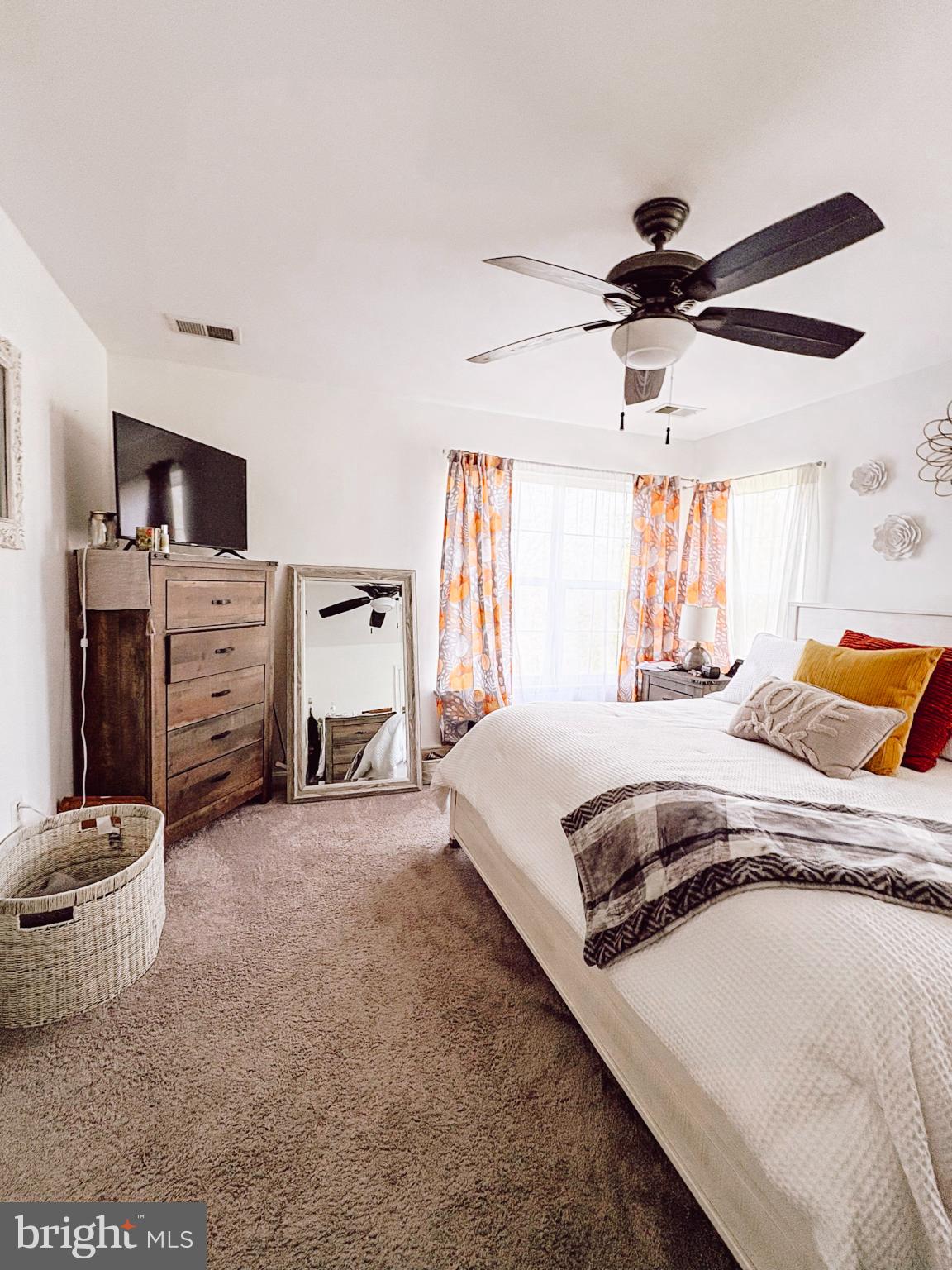 6151 Newton Lane Bealeton, VA 22712 - Photo 38 of 47 Serene bedroom with natural light and charm.