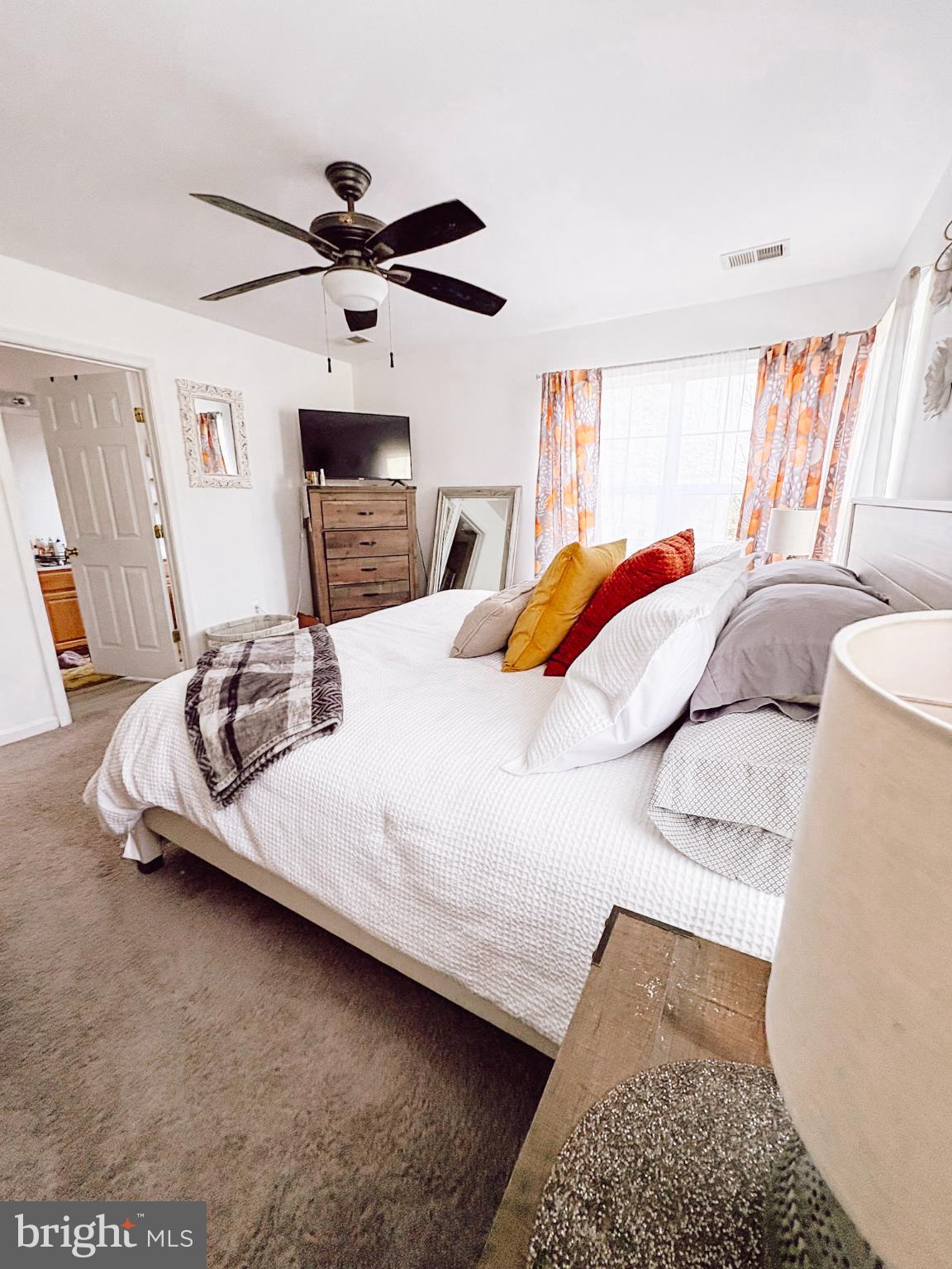 6151 Newton Lane Bealeton, VA 22712 - Photo 40 of 47 Cozy bedroom with warm, inviting decor.