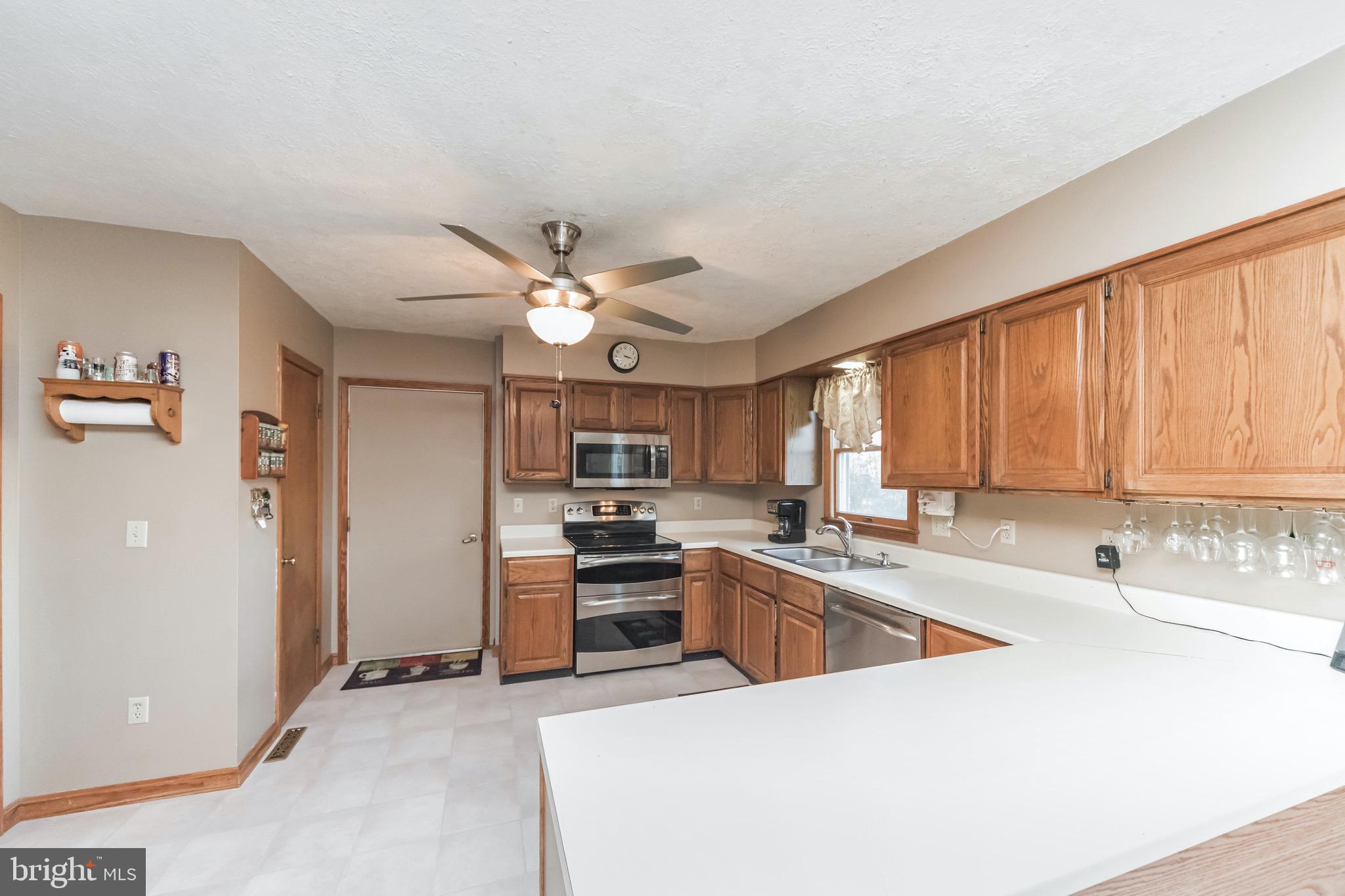 2400 Flag Marsh Road Mount Airy, MD 21771 - Photo 18 of 39 Double ovens in this Kitchen w/Ceiling Fan