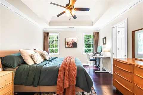 a bed room with a bed and a window