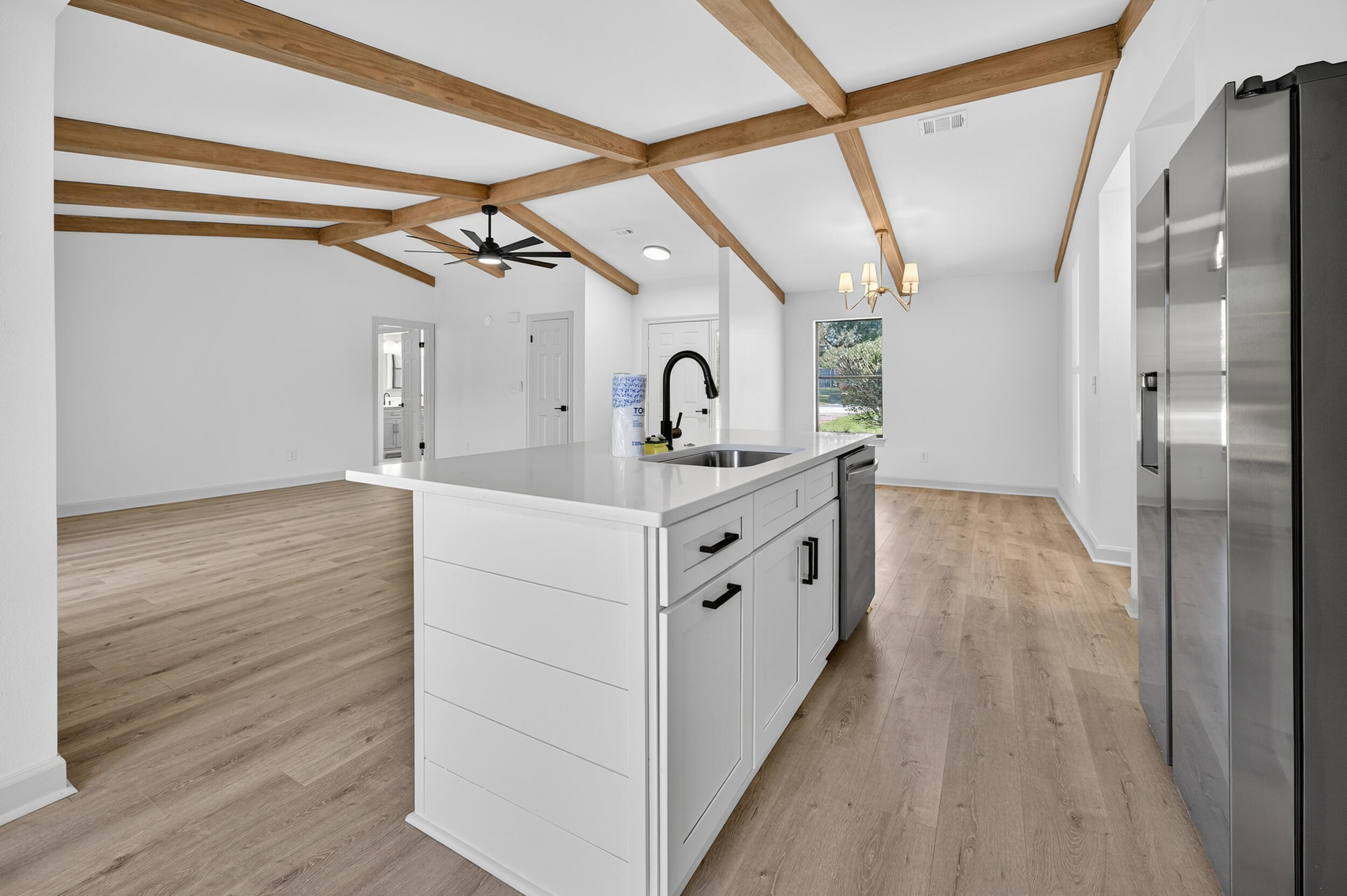 926 Ridgewood Way Niceville, FL 32578 - Photo 17 of 68 a bathroom with a sink a mirror and a shower