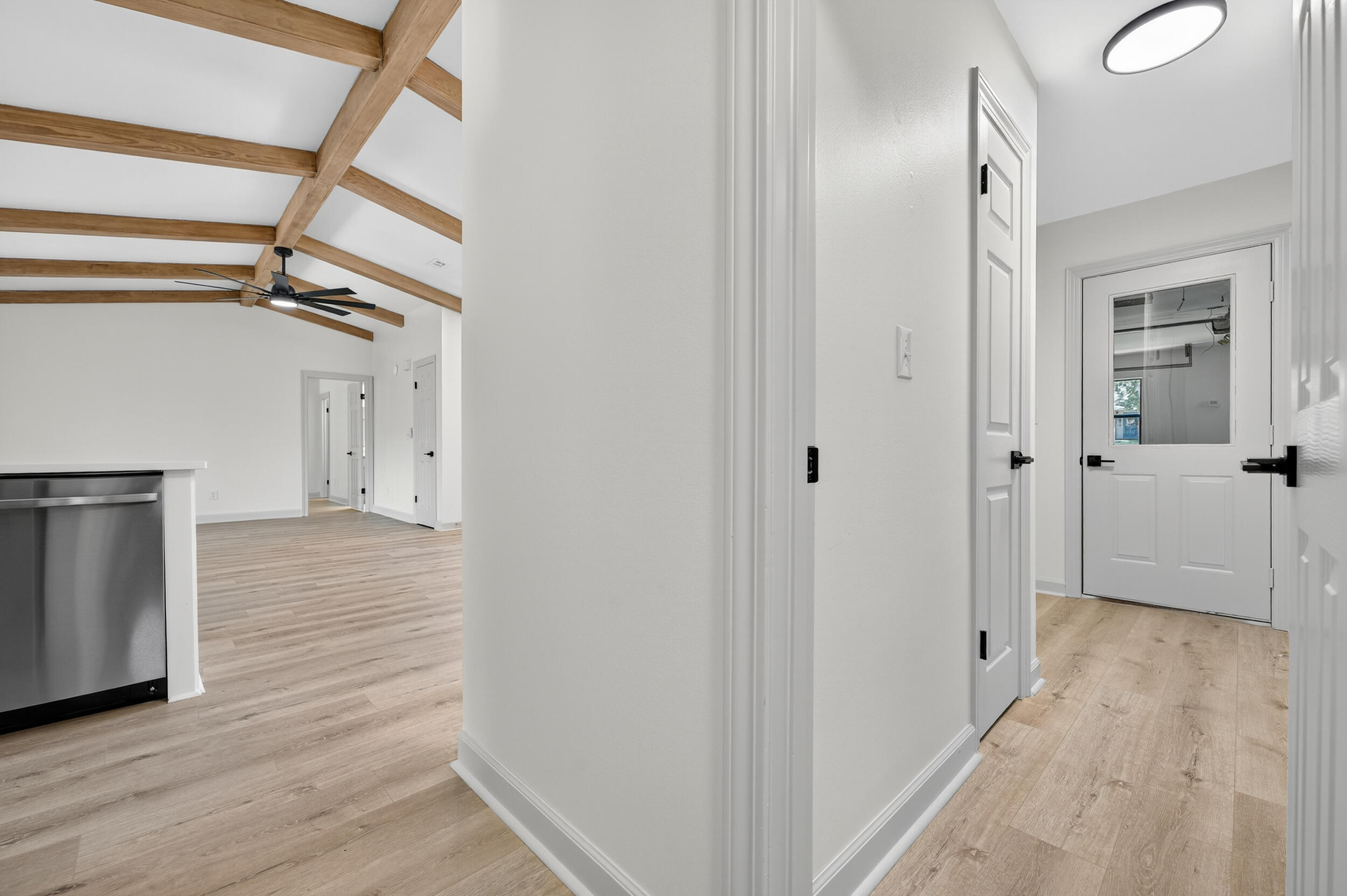 926 Ridgewood Way Niceville, FL 32578 - Photo 40 of 68 a view of a hallway with wooden floor and staircase