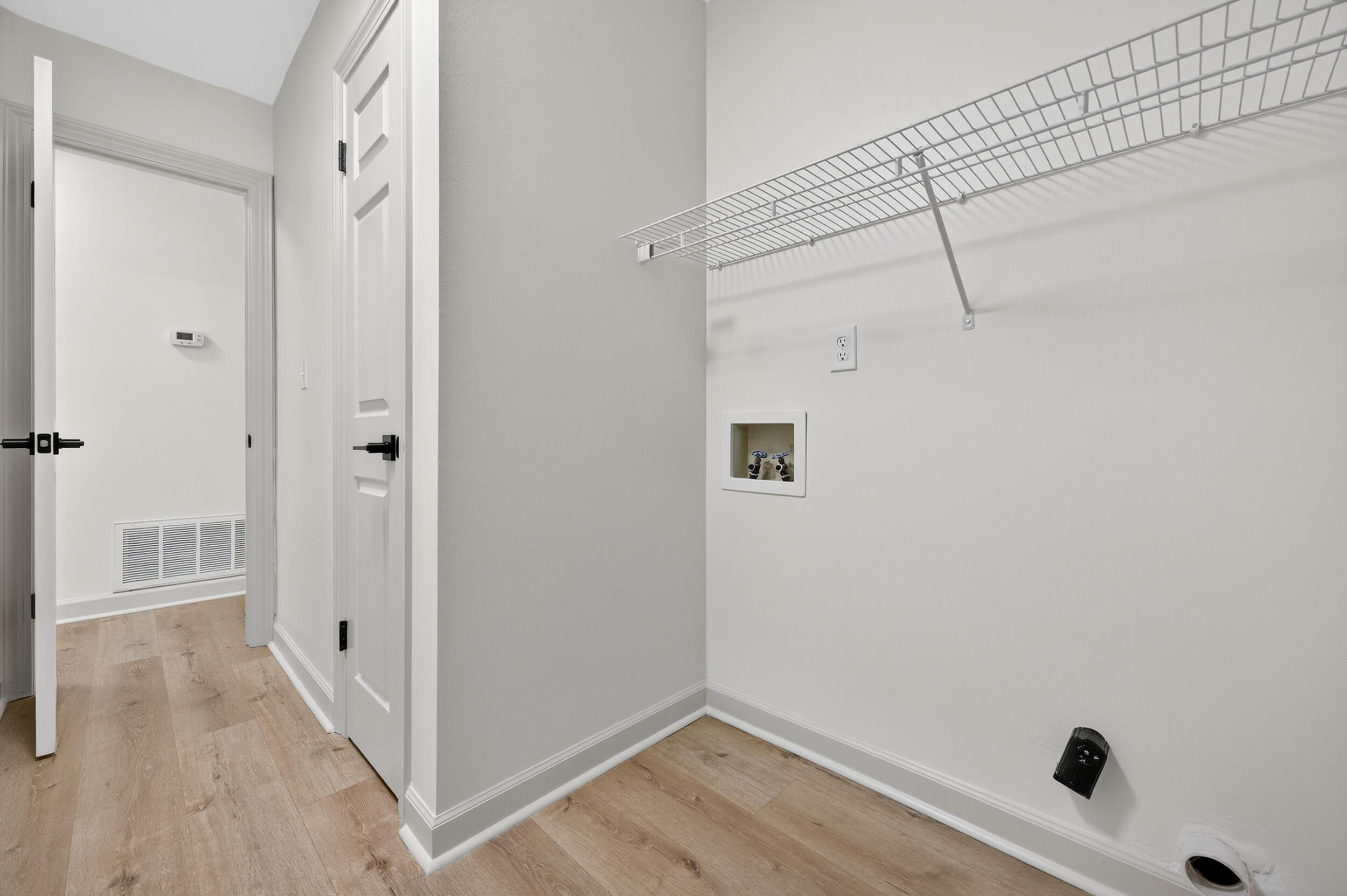 926 Ridgewood Way Niceville, FL 32578 - Photo 45 of 68 a view of a room with wooden floor and white walls