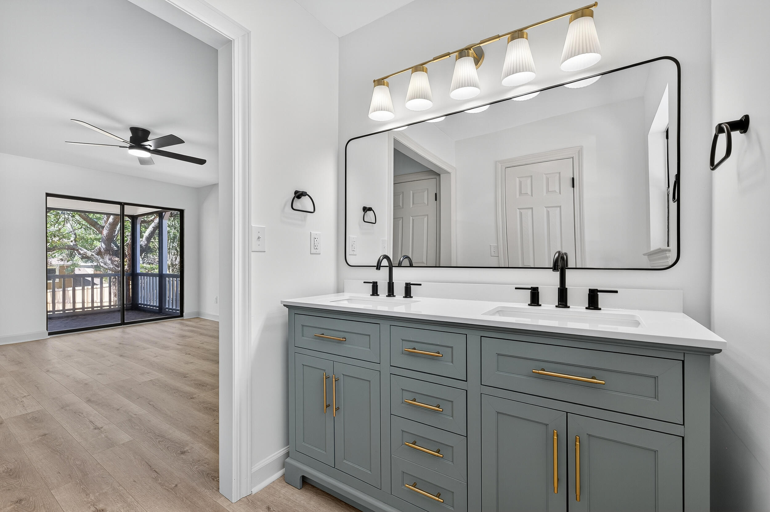 926 Ridgewood Way Niceville, FL 32578 - Photo 5 of 68 a spacious bathroom with a double vanity sink mirror and