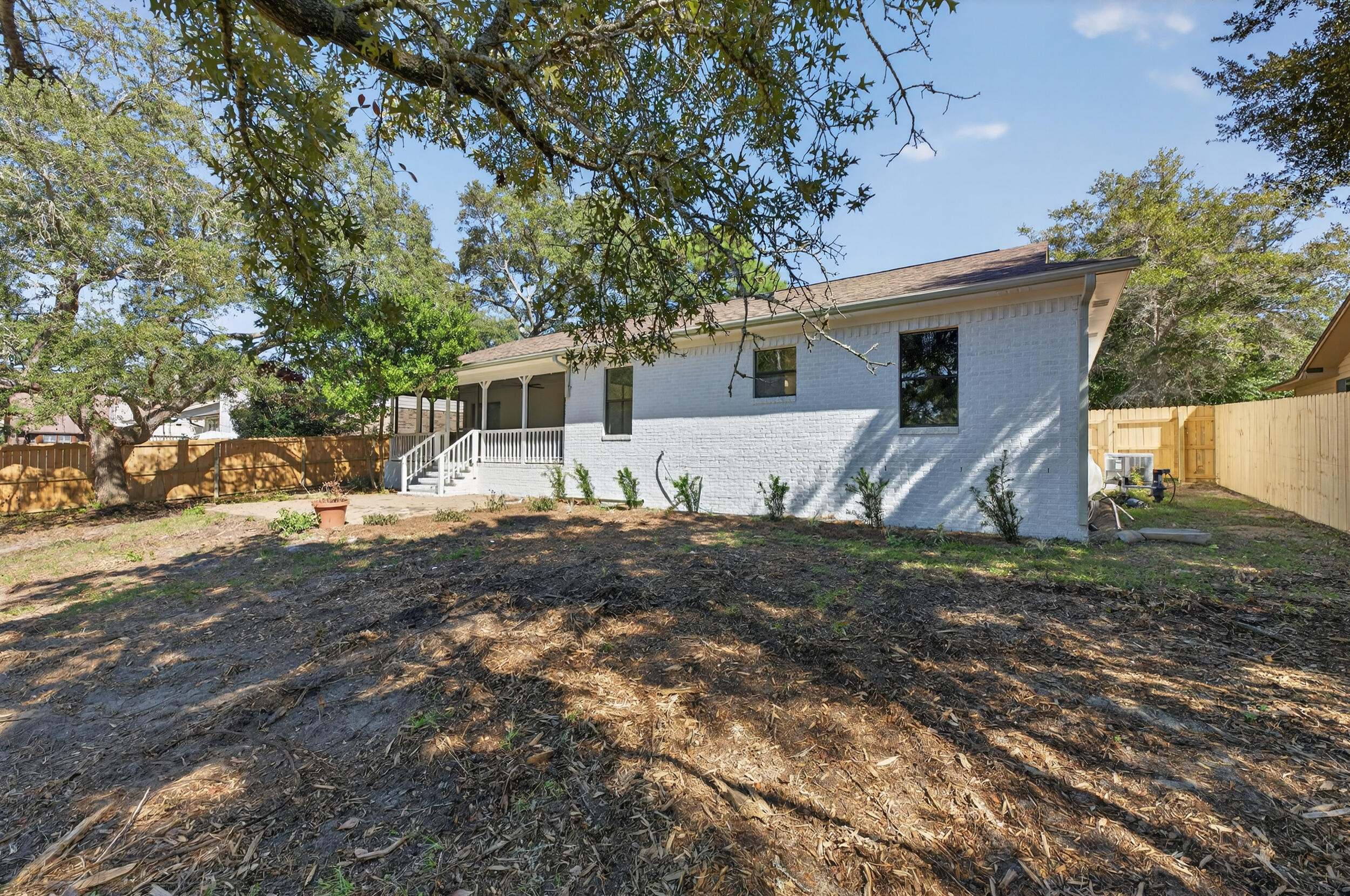 926 Ridgewood Way Niceville, FL 32578 - Photo 55 of 68 a view of a house with a yard