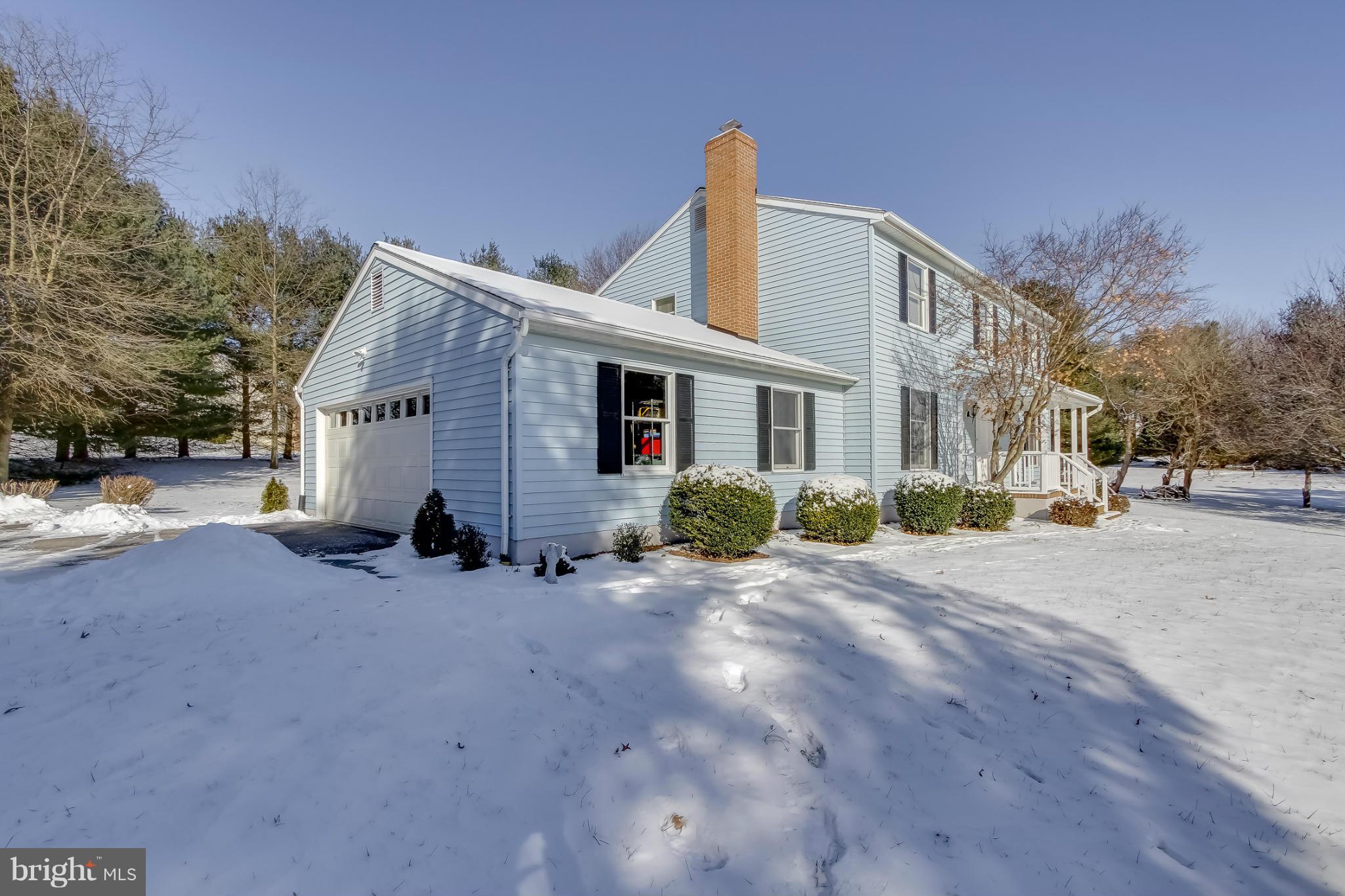 14015 Foxland Road Phoenix, MD 21131 - Photo 21 of 24 a view of a house with a patio
