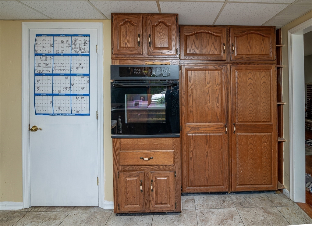 300 Mason Rd Extension Dudley, MA 01571 - Photo 13 of 42 a kitchen with granite countertop stainless steel appliances and cabinets