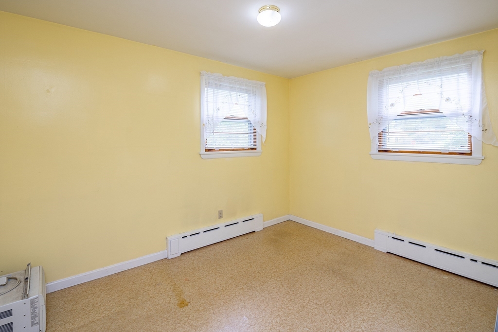 300 Mason Rd Extension Dudley, MA 01571 - Photo 20 of 42 a view of a room with blue walls