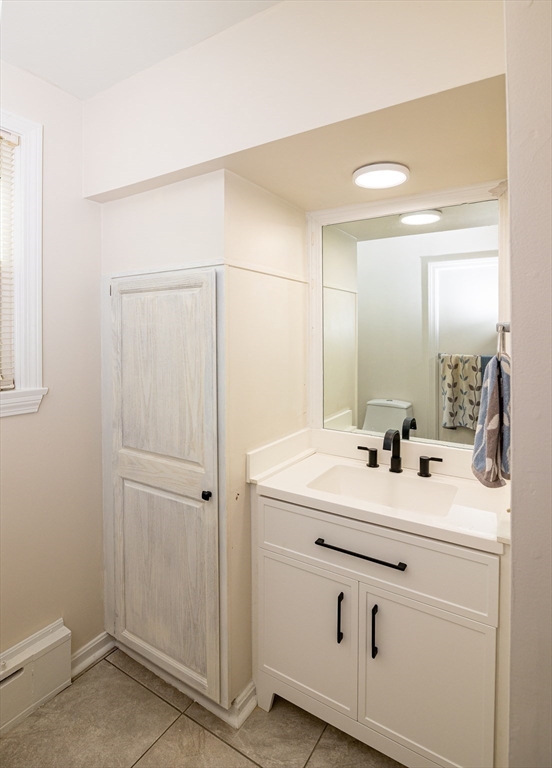 300 Mason Rd Extension Dudley, MA 01571 - Photo 21 of 42 a bathroom with a sink vanity and a mirror
